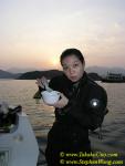 022 Takako 06 in drysuit eating congee